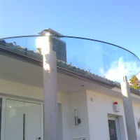 Sonderanfertigung Vordach aus Glas mit Edelstahl Sonderanfertigung Vordach aus Glas mit Edelstahl