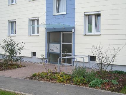 Sozialbau Wohnungen in Kempten mit Glasvordächern Punto